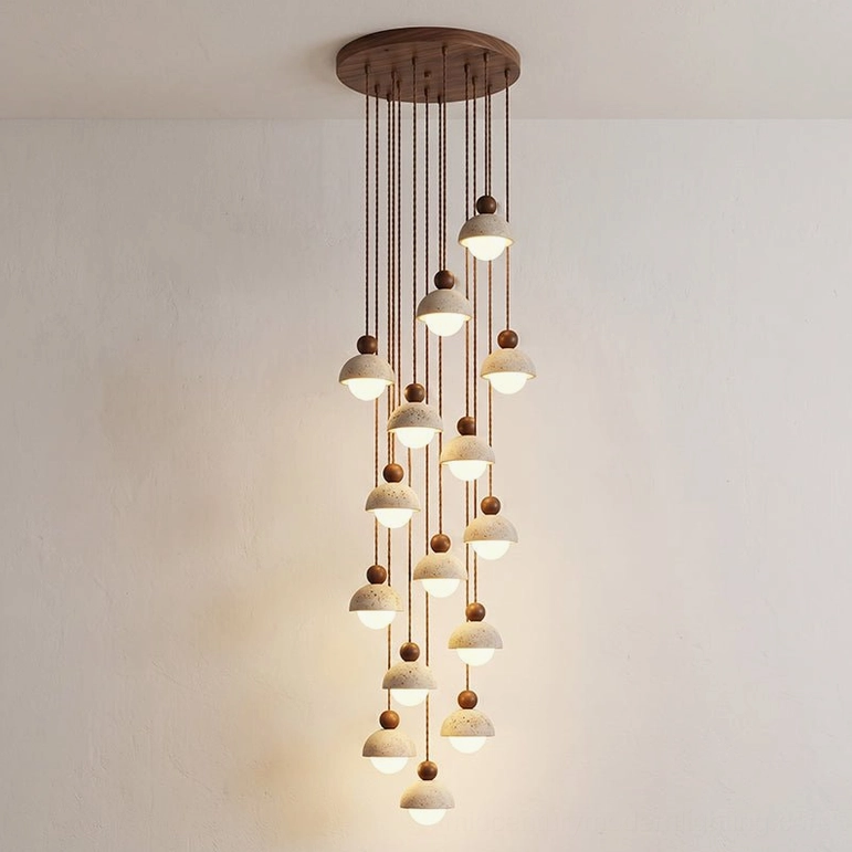 Palermo 15-head pendant chandelier mid-size arrangement showing warm travertine glow