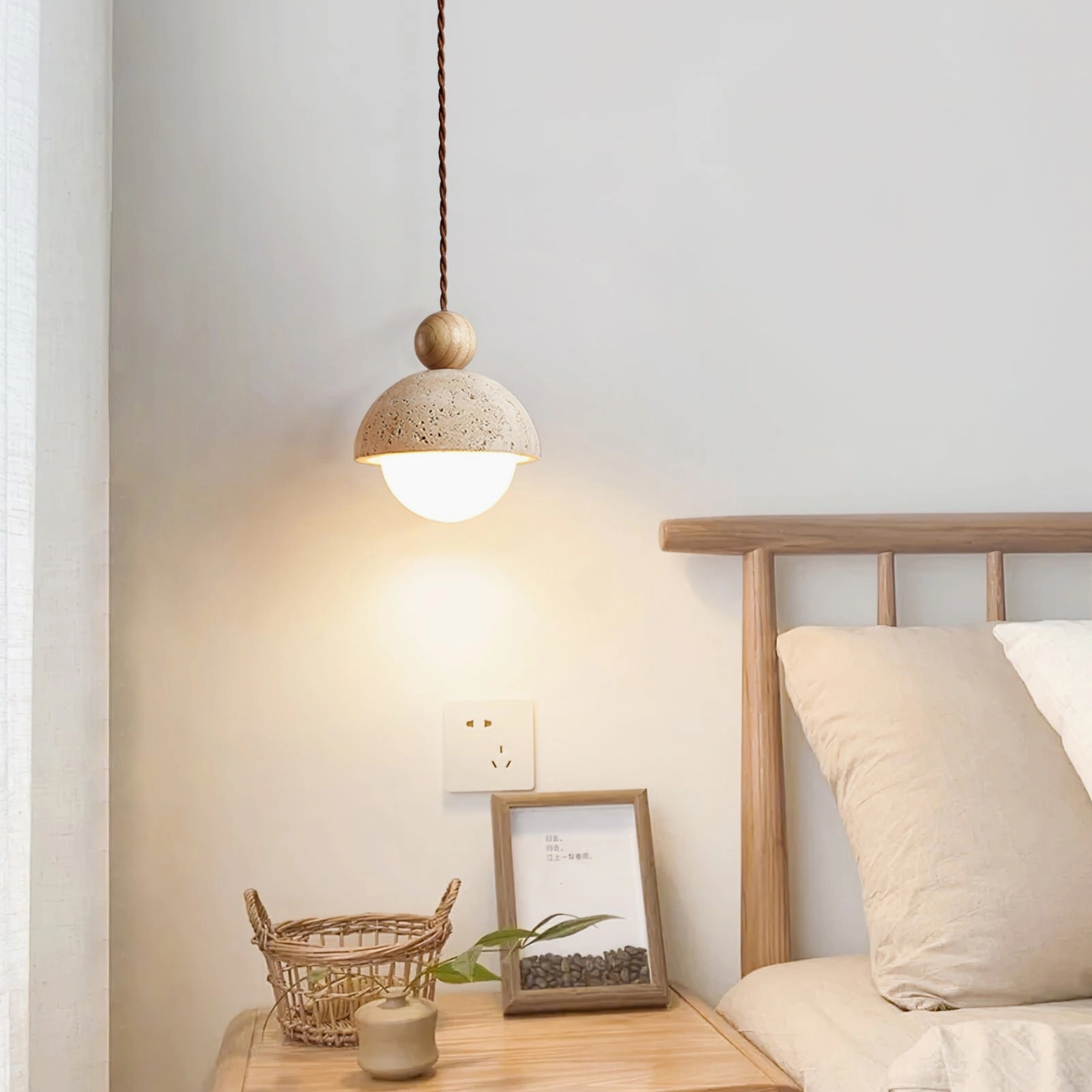 Single Palermo pendant light creating warm ambient glow over bedroom nightstand