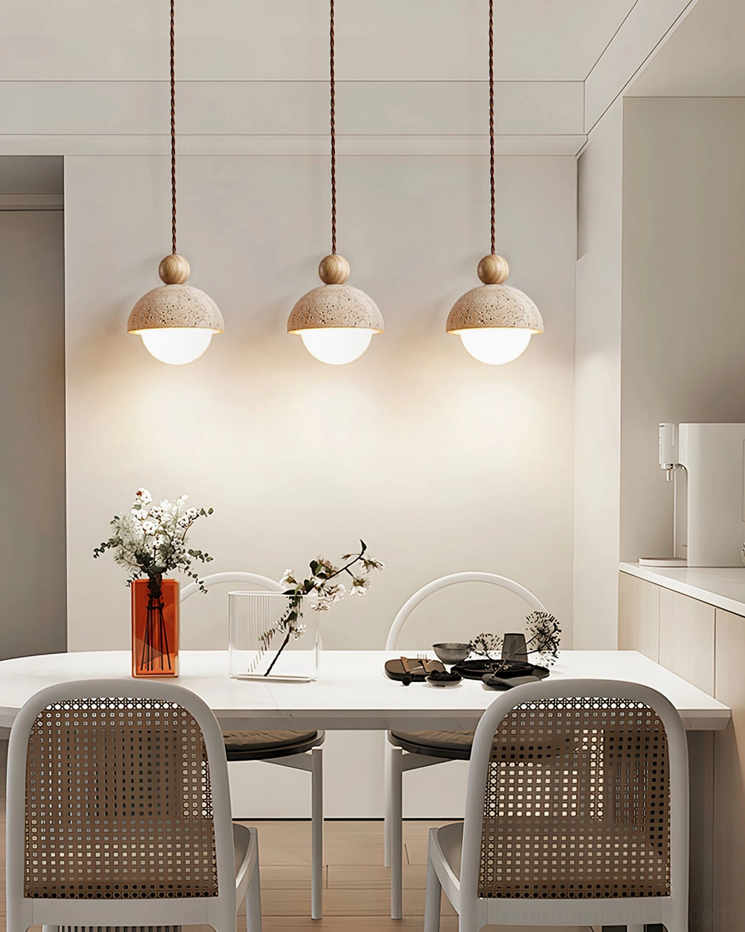 Palermo pendant creating warm light pool showing travertine glow characteristics