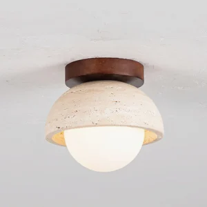 Palermo ceiling light side profile showing travertine texture and warm illuminated frosted glass diffuser