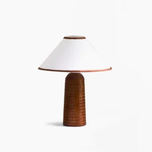 Palisades mid-century modern table lamp with brown ribbed wood base and white conical fabric shade, studio front view