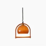 Pallade mid-century pendant lamp with walnut wood frame and amber glass shade, front view showcase