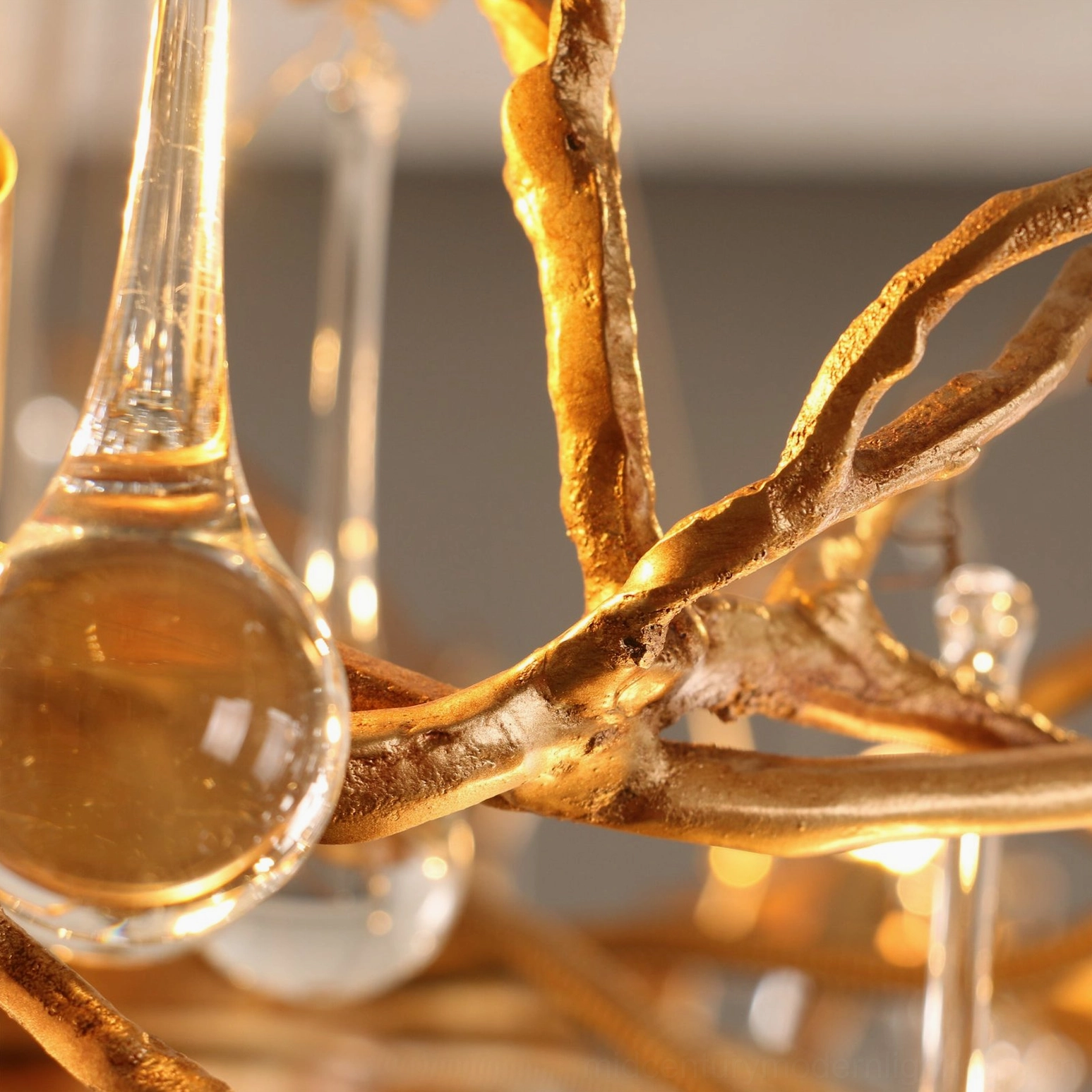 Palwa chandelier brass frame close-up textured gold metal branches hand-blown glass