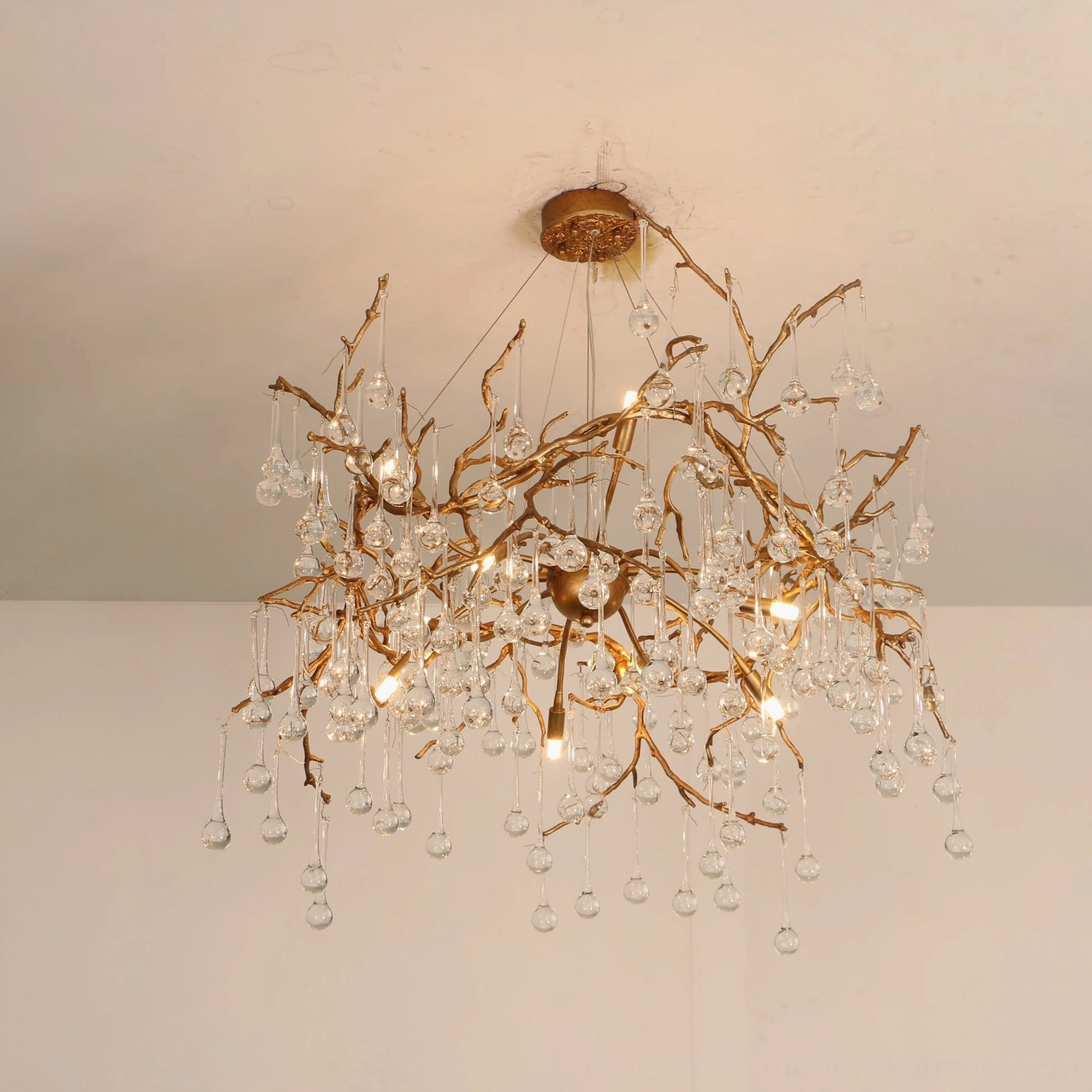 Palwa branch crystal chandelier dual-tone background scattered glass droplets lit bulbs