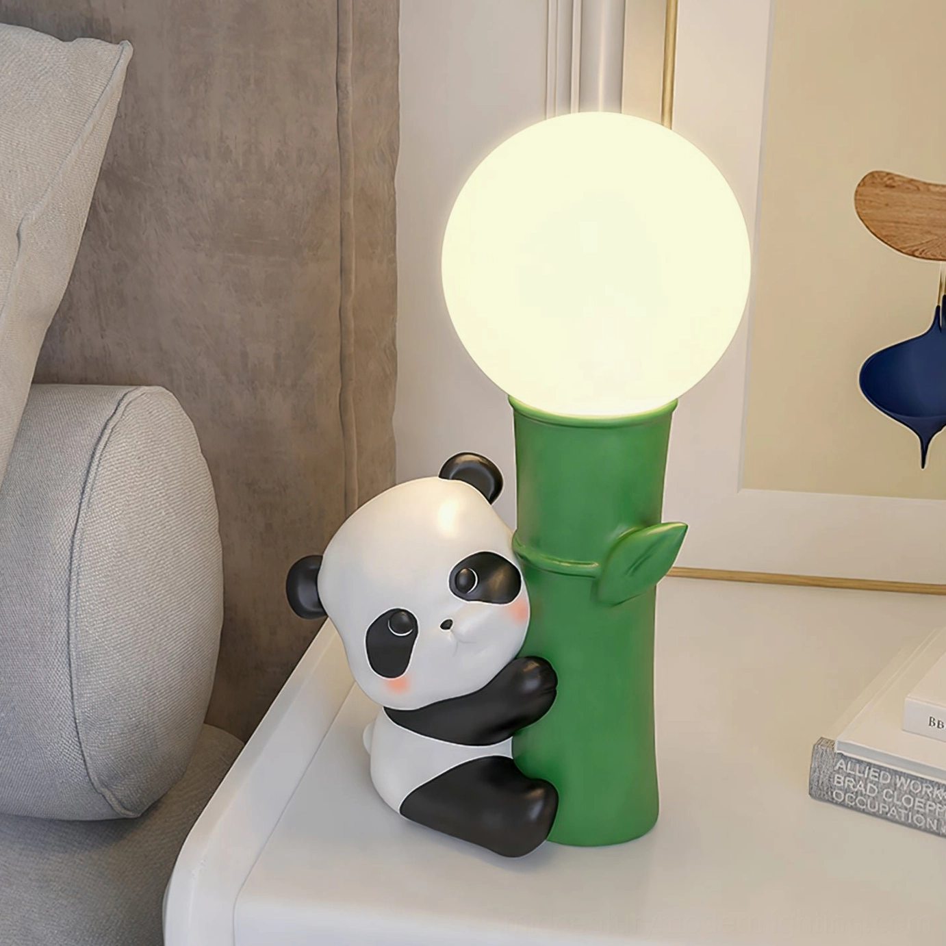 Panda Bamboo Table Lamp displayed on living room side table with grey sofa backdrop