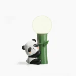 Panda Bamboo Table Lamp with resin and bamboo construction, front view on white background