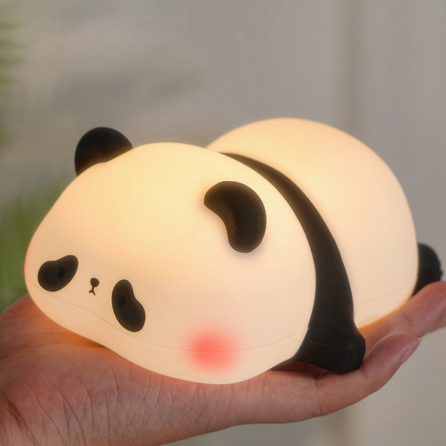 Panda silicone night light compact size showing portability for desk or bedside placement