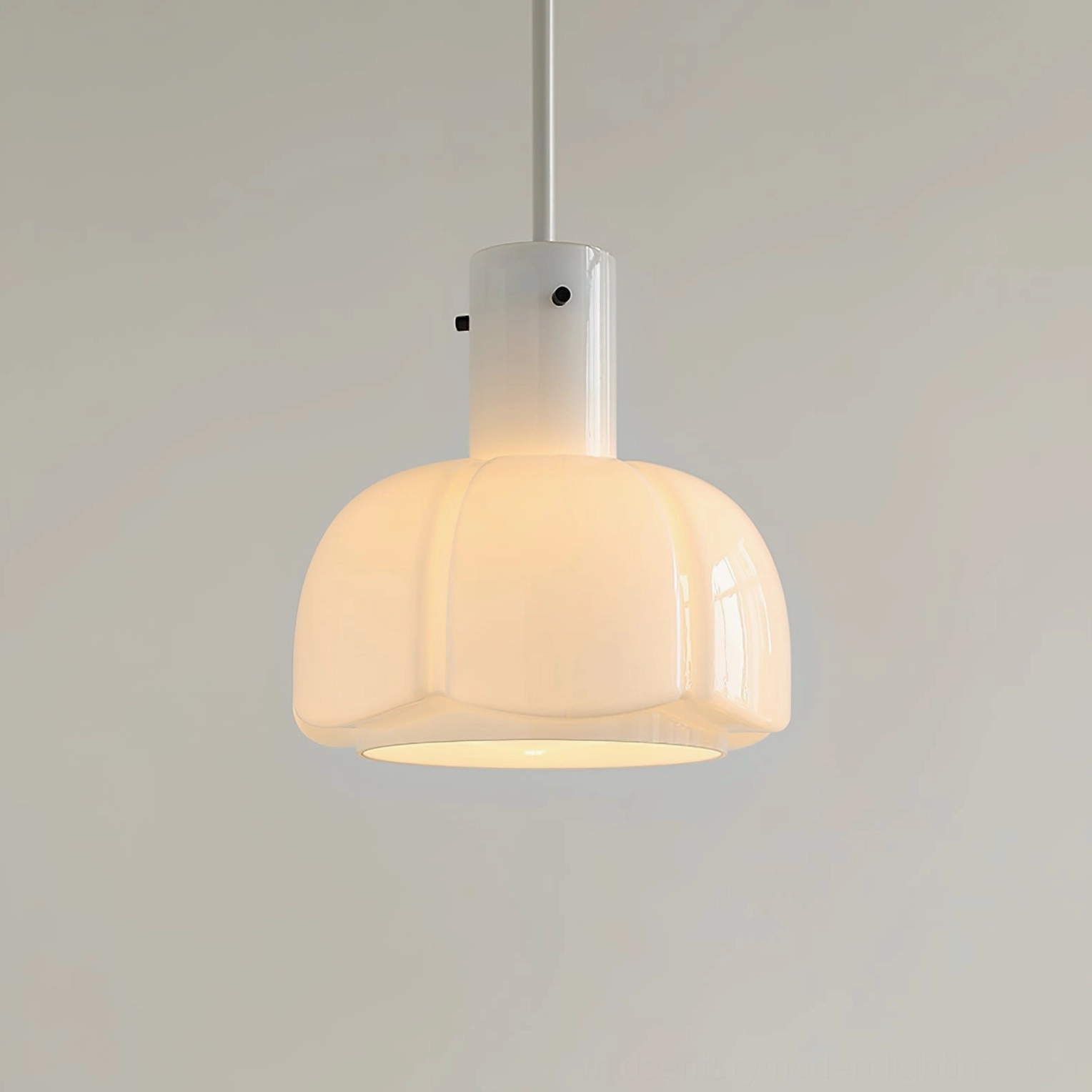 Paolina pendant light installation view showing ceiling mount and cord length for dining space