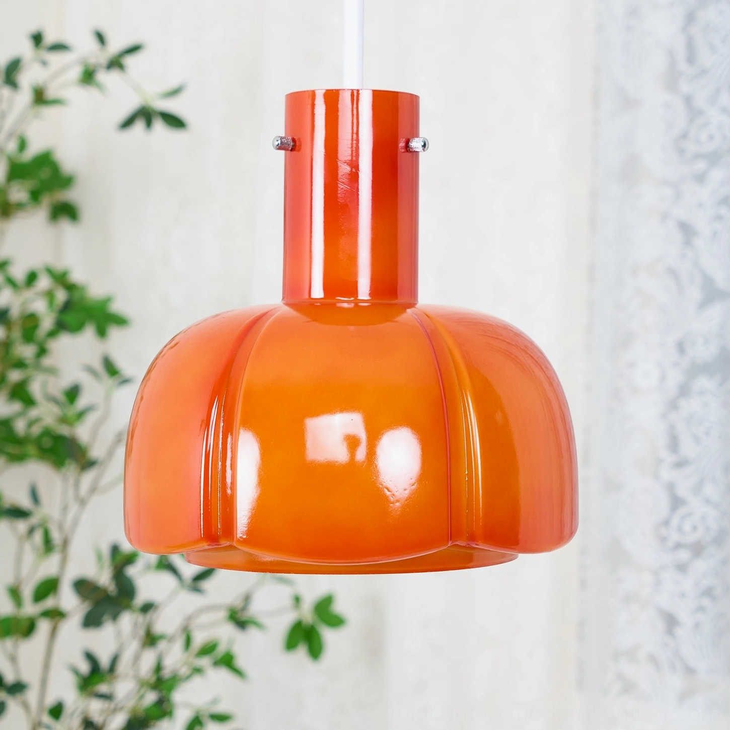 Paolina glass pendant light detail showing pumpkin shape glass globe and light transmission quality