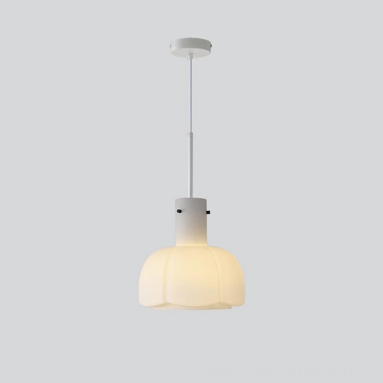 Pink Paolina glass pendant light linen textiles warm wood furniture bedroom cocoon