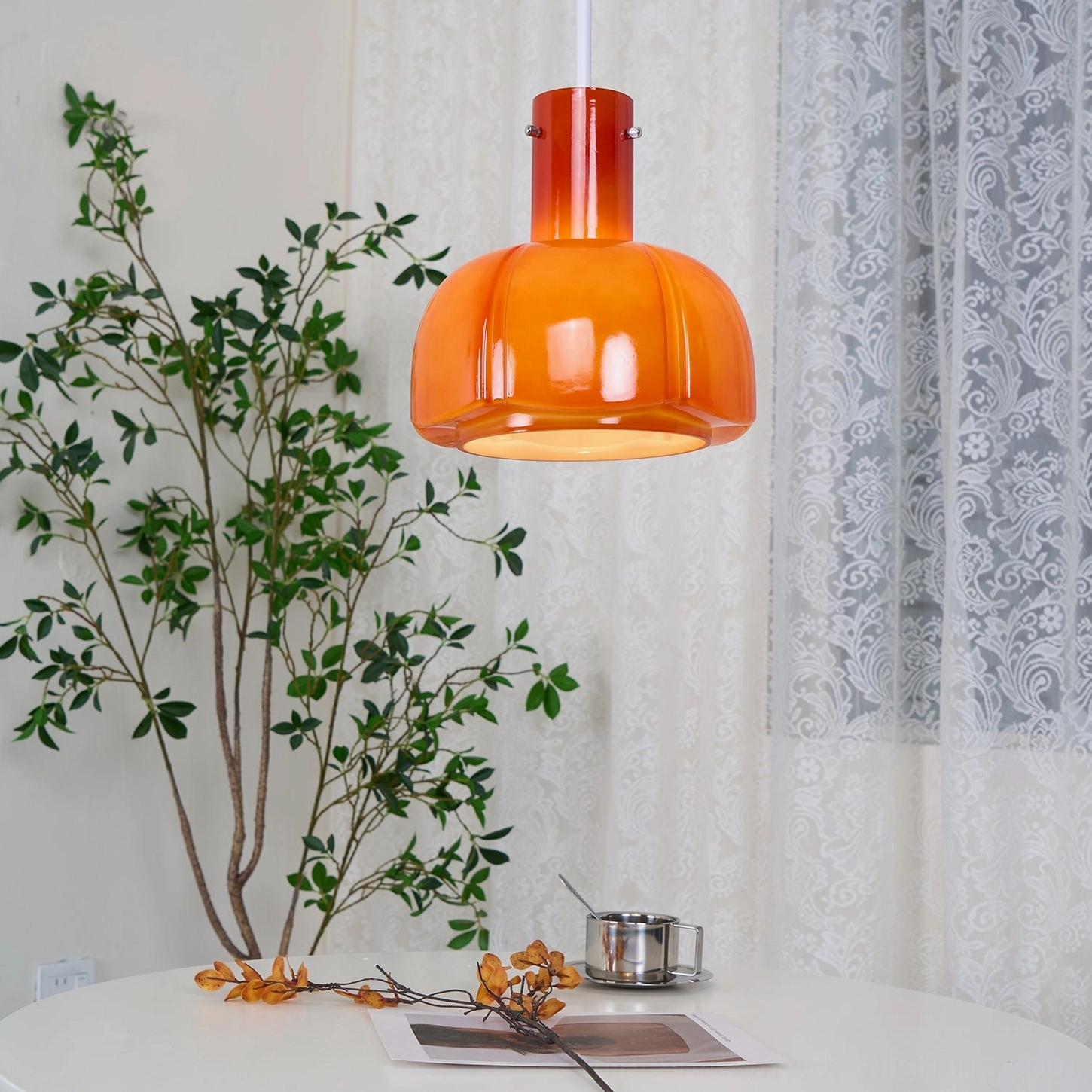 Pink Paolina glass pendant light mid-century modern aesthetic in contemporary living space