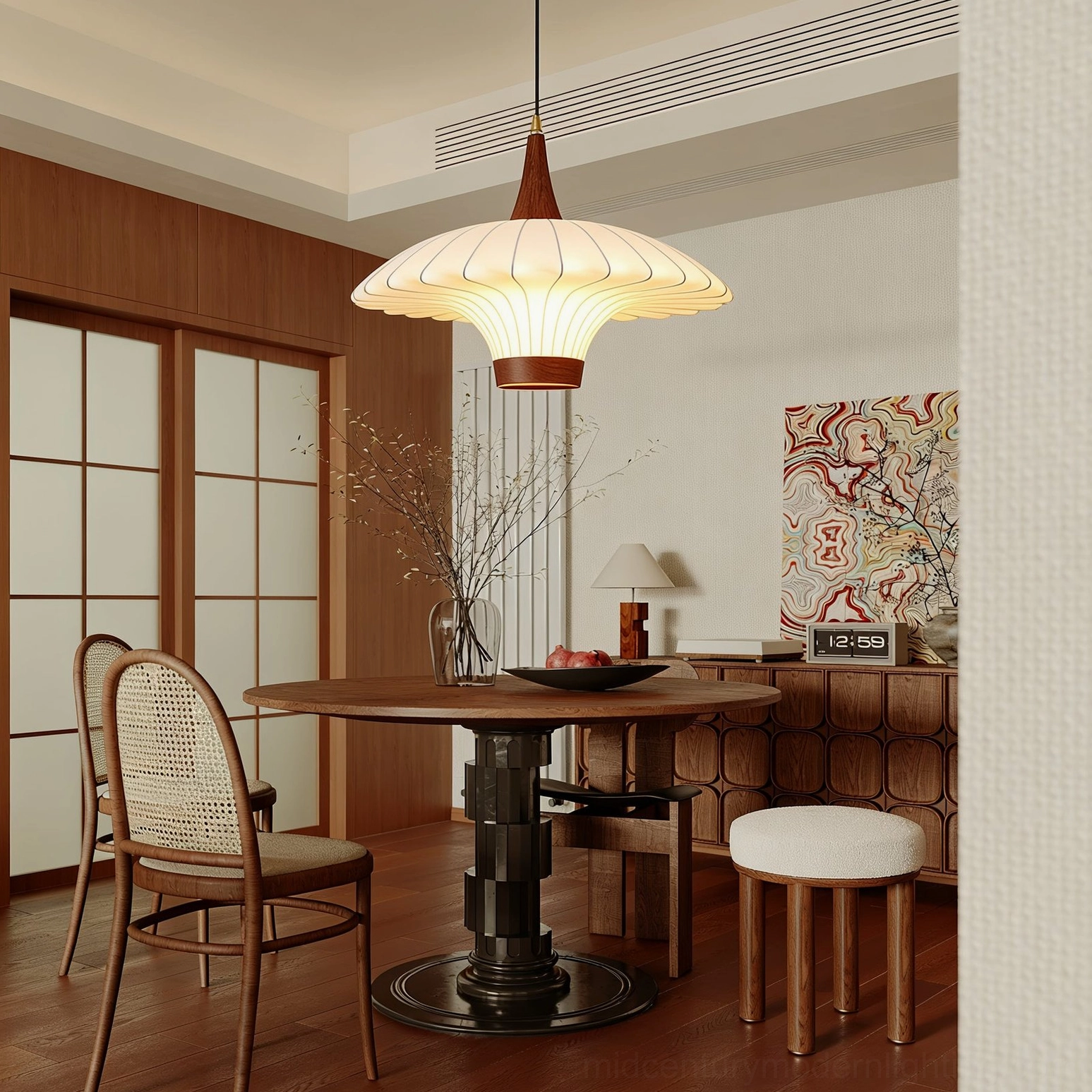 Mid-century modern pendant light illuminating Japanese-style wooden dining space with warm neutral tones and off-white fabric shade