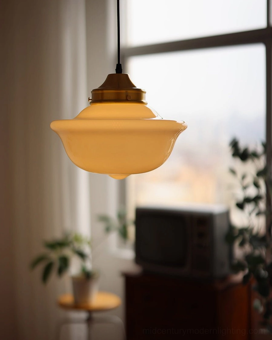 Illuminated Pathson pendant light in sunlit retro apartment with ambient warm light and vintage furnishings