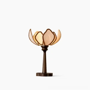 Pauline lotus table lamp front view with milky semi-transparent petal-shaped fabric shade and walnut wood base, studio white background