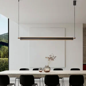 Pavilion LED linear chandelier installed above dining table in contemporary minimalist dining room with modern decor