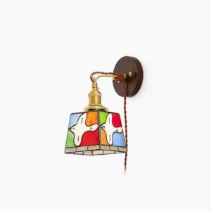 Peace dove stained glass wall lamp with brass hardware and twisted brown cord, showcasing full profile view against white background