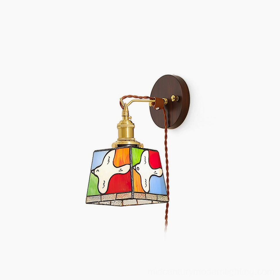 Peace dove stained glass wall lamp with brass hardware and twisted brown cord, showcasing full profile view against white background