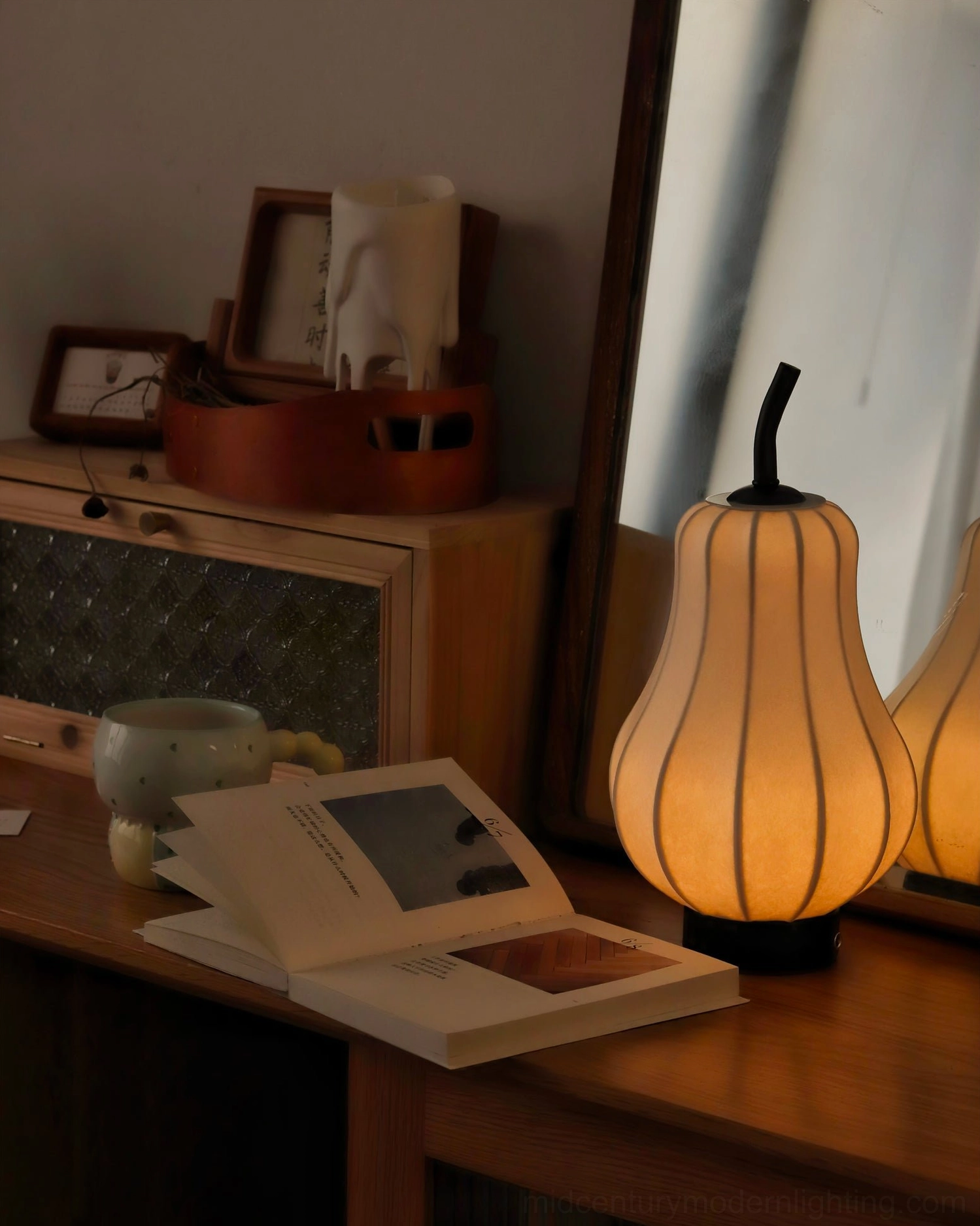 Modern cordless pear lamp black finish option on minimal contemporary furniture