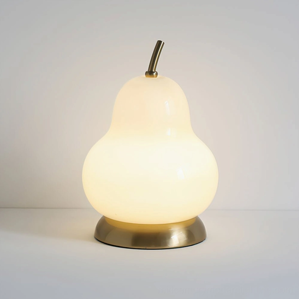 Pear-shaped cordless glass table lamp showing multiple finish options, modern minimalist design with LED technology