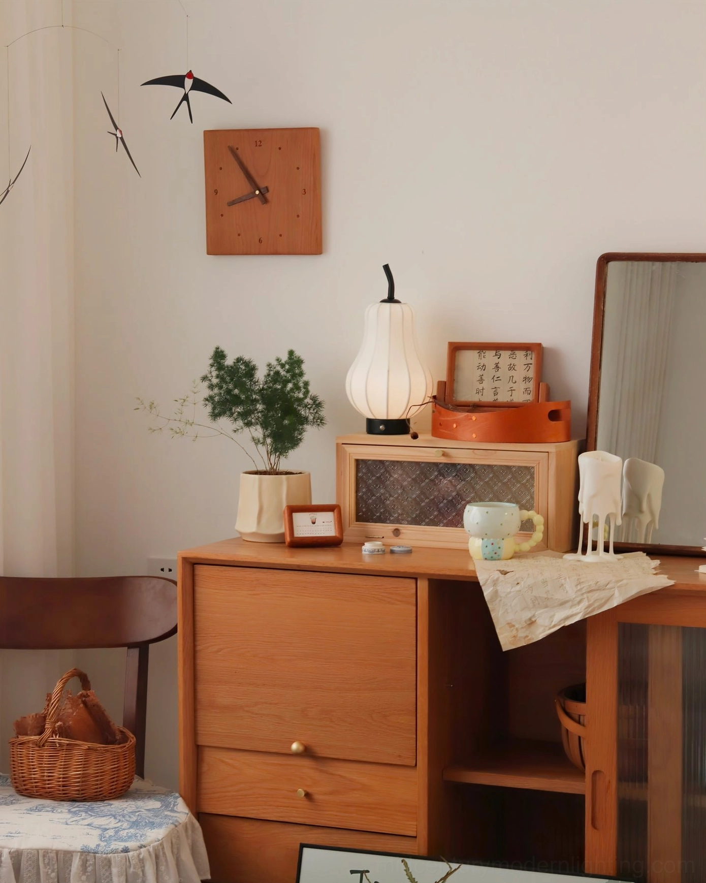 Rechargeable pear lamp in Japanese-style study corner with wooden home furniture and desk