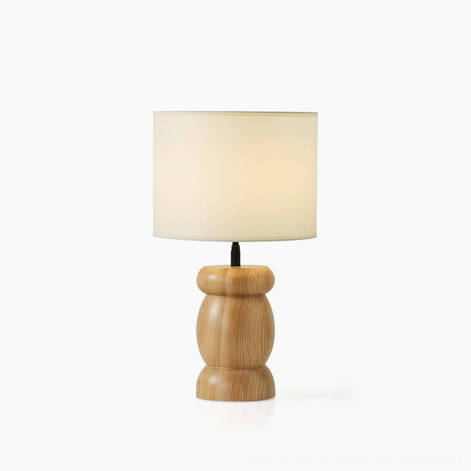 Pebble wood table lamp with natural wood base and beige fabric shade, minimalist Nordic design, front view on white isolated background