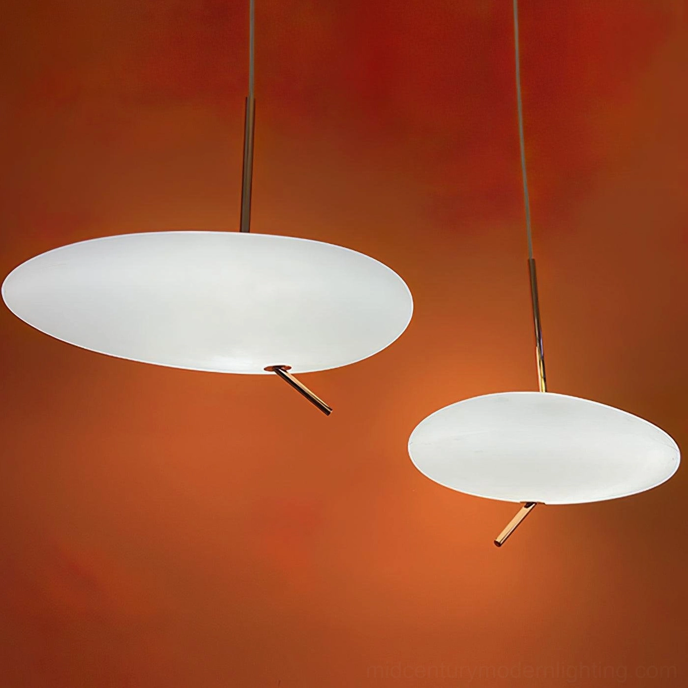 Pebbles pendant light showing cable suspension design and minimalist aesthetic in bright modern space