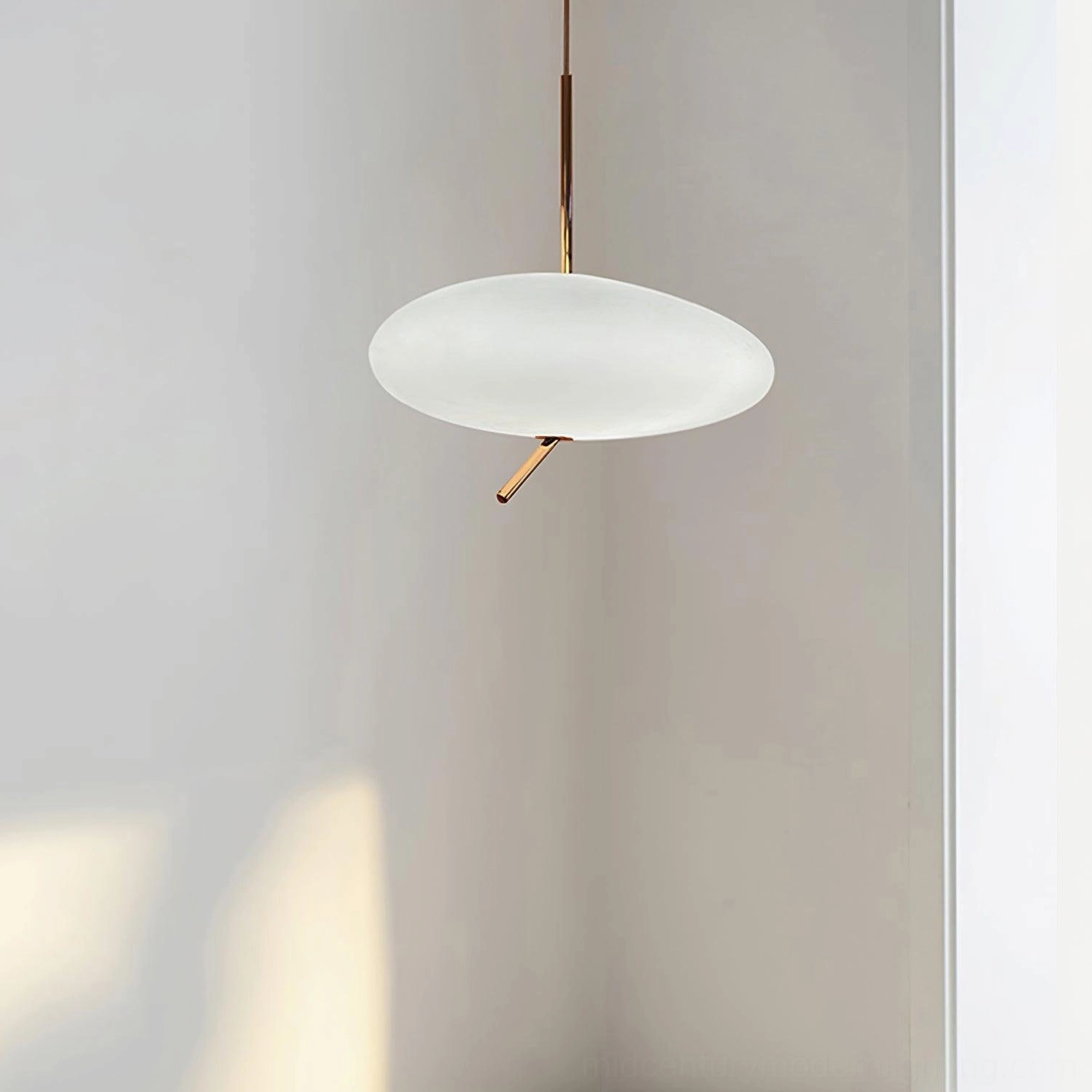 Pebbles pendant light in contemporary living space with modern furniture and neutral color palette