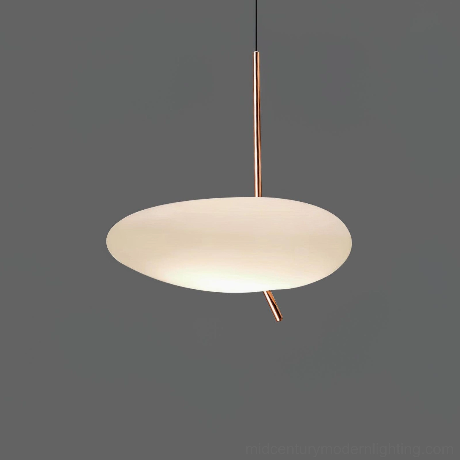 Pebbles pendant light in creative workspace with artistic decor and natural light complementation