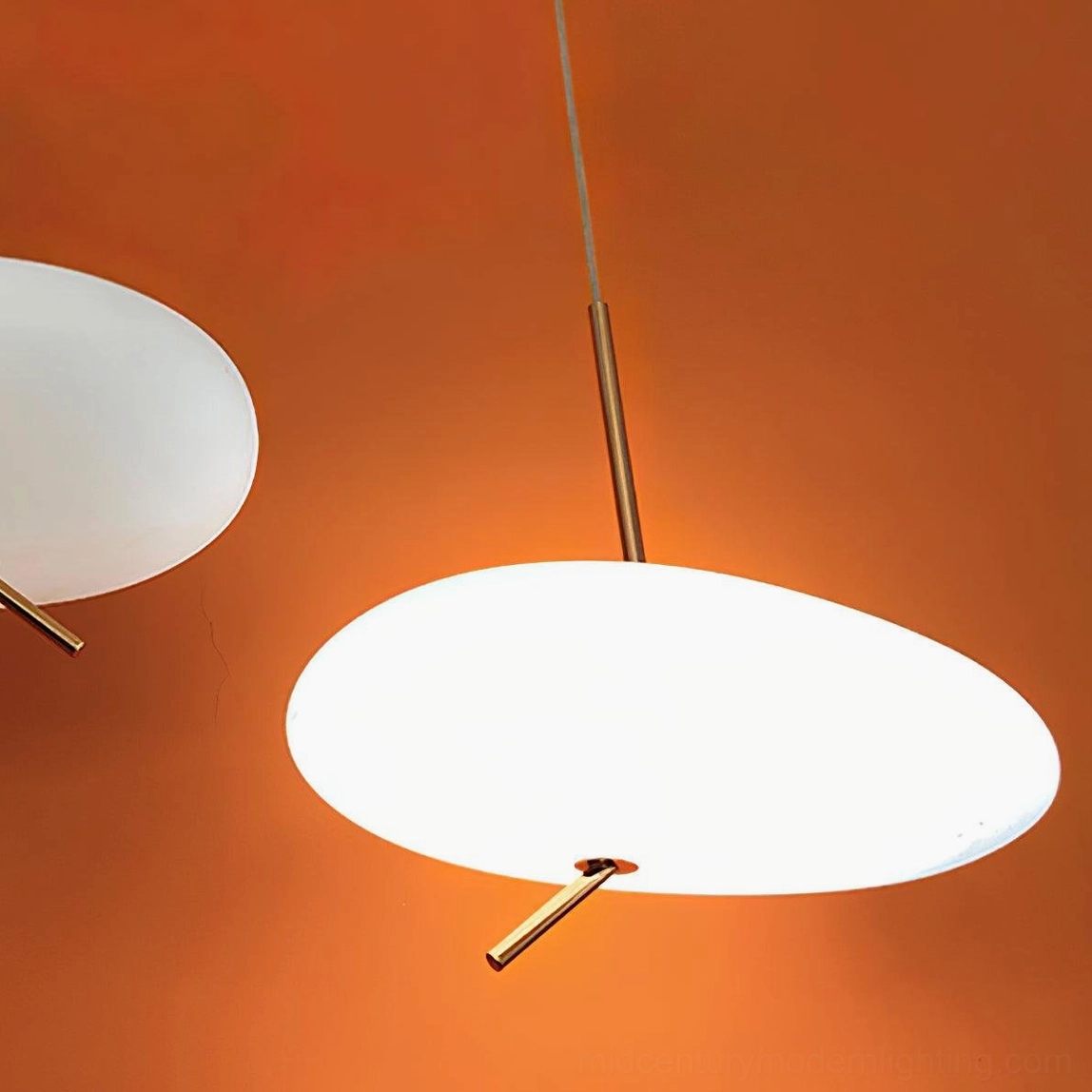 Pebbles pendant light in luxury modern home with premium finishes and sophisticated decor elements