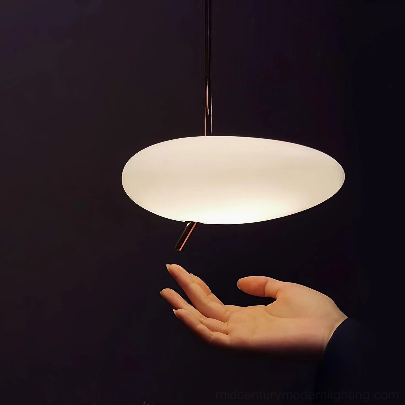 Pebbles pendant light featuring organic geometry design in mid-century modern interior space
