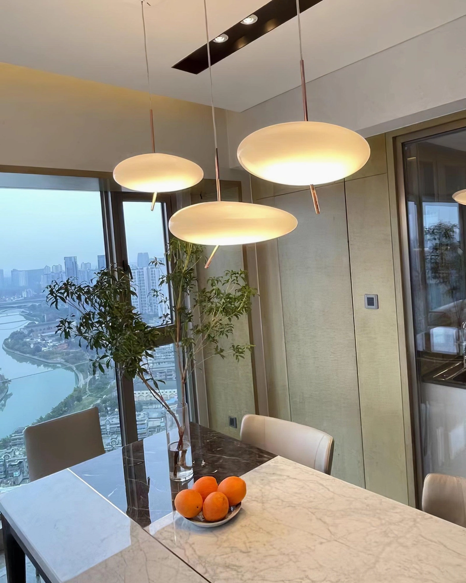 Pebbles pendant light close-up of shade surface texture and LED light source quality