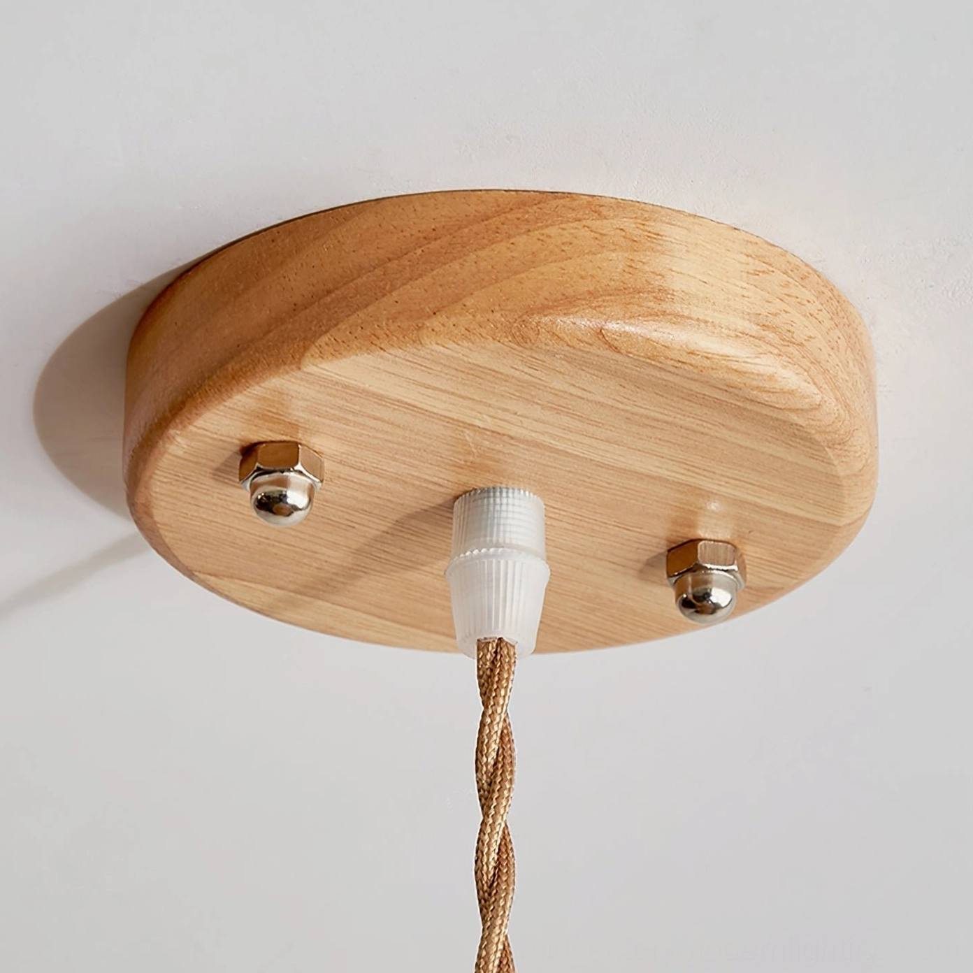 Boho pendant lamp ceiling mount hardware detail, twisted fabric cord and metal fixtures on white background