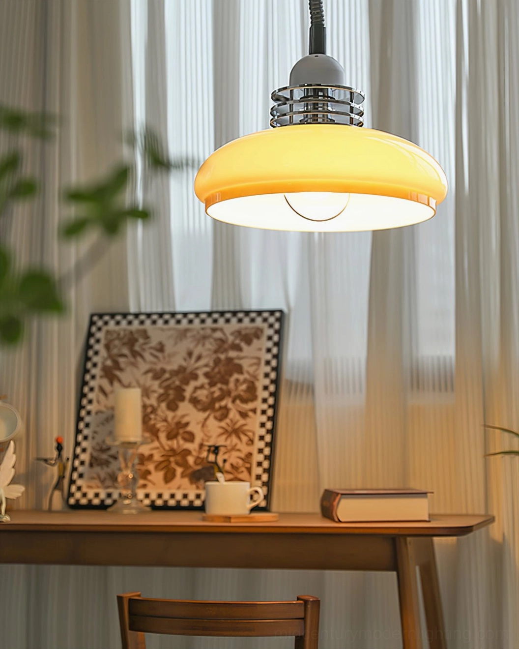 Chrome metal and glass vintage pendant lamp demonstrating light diffusion and glare-free illumination characteristics