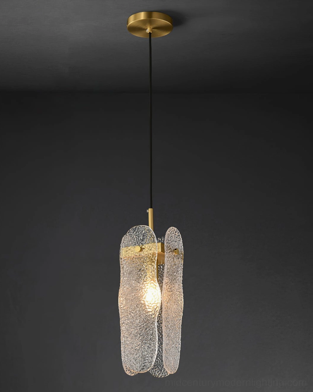 Overhead view minimalist glass pendant with exposed bulb hanging cord design