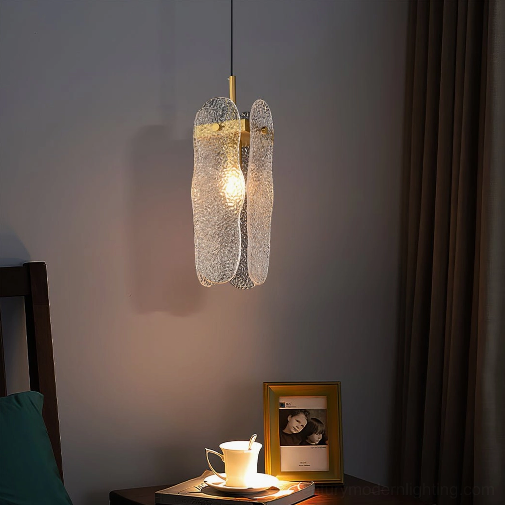 Brass pendant fixture bedside installation dark curtains and decorative accessories