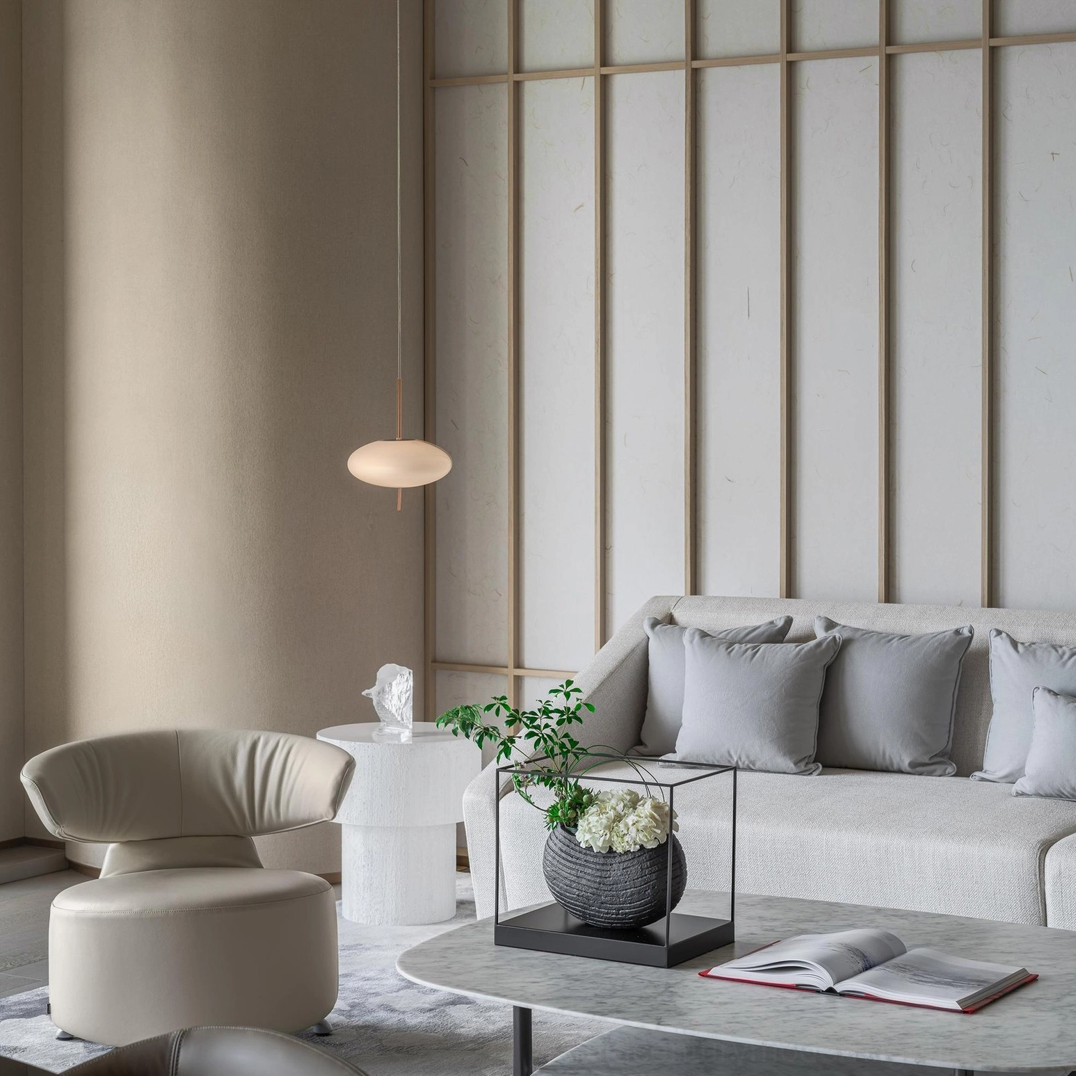 Pebbles pendant light side view in modern formal living room with sofa set, neutral warm minimalist style