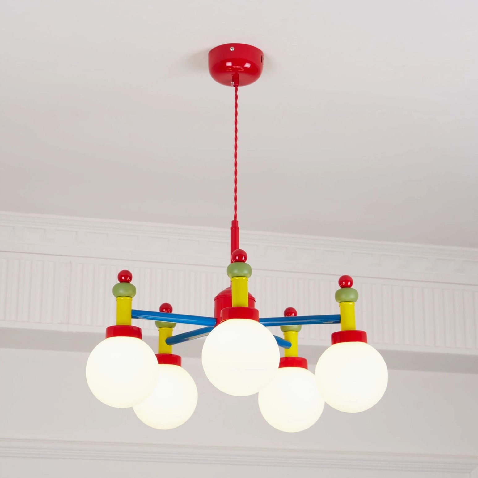Decorative pendant light with frosted glass shades and contemporary geometric design