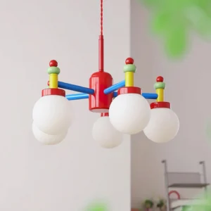 Illuminated colorful pendant lamp close-up showing frosted glass bulbs and metal frame details