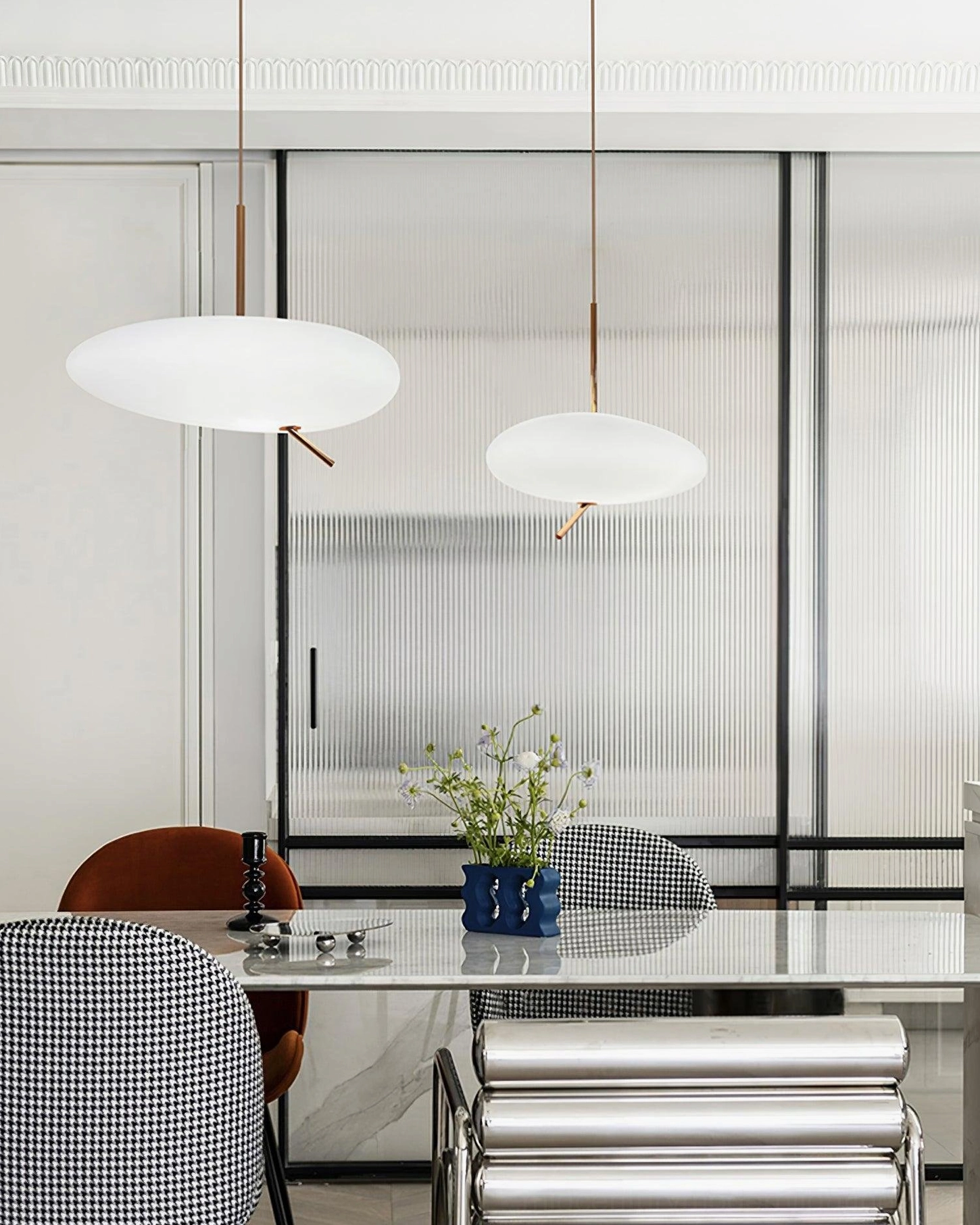 Pebbles pendant light installation shot showing cable length and ceiling mounting hardware details