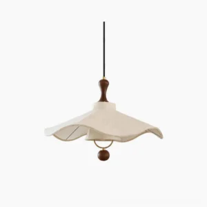 Pendolo fabric pendant light with embroidered off-white shade and wooden accent ball, studio front view