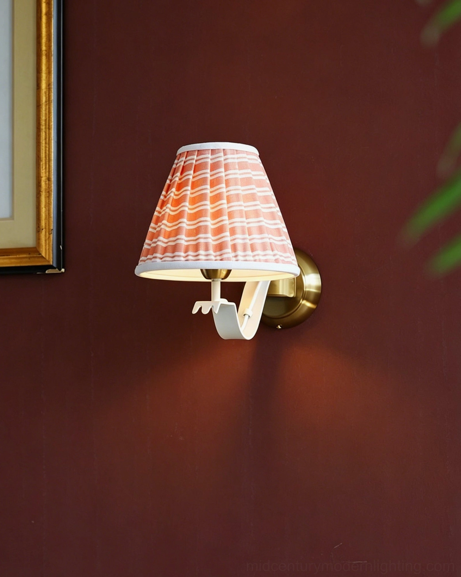 Penelope pleated wall sconce paired flanking bathroom mirror for spa-like professional vanity lighting