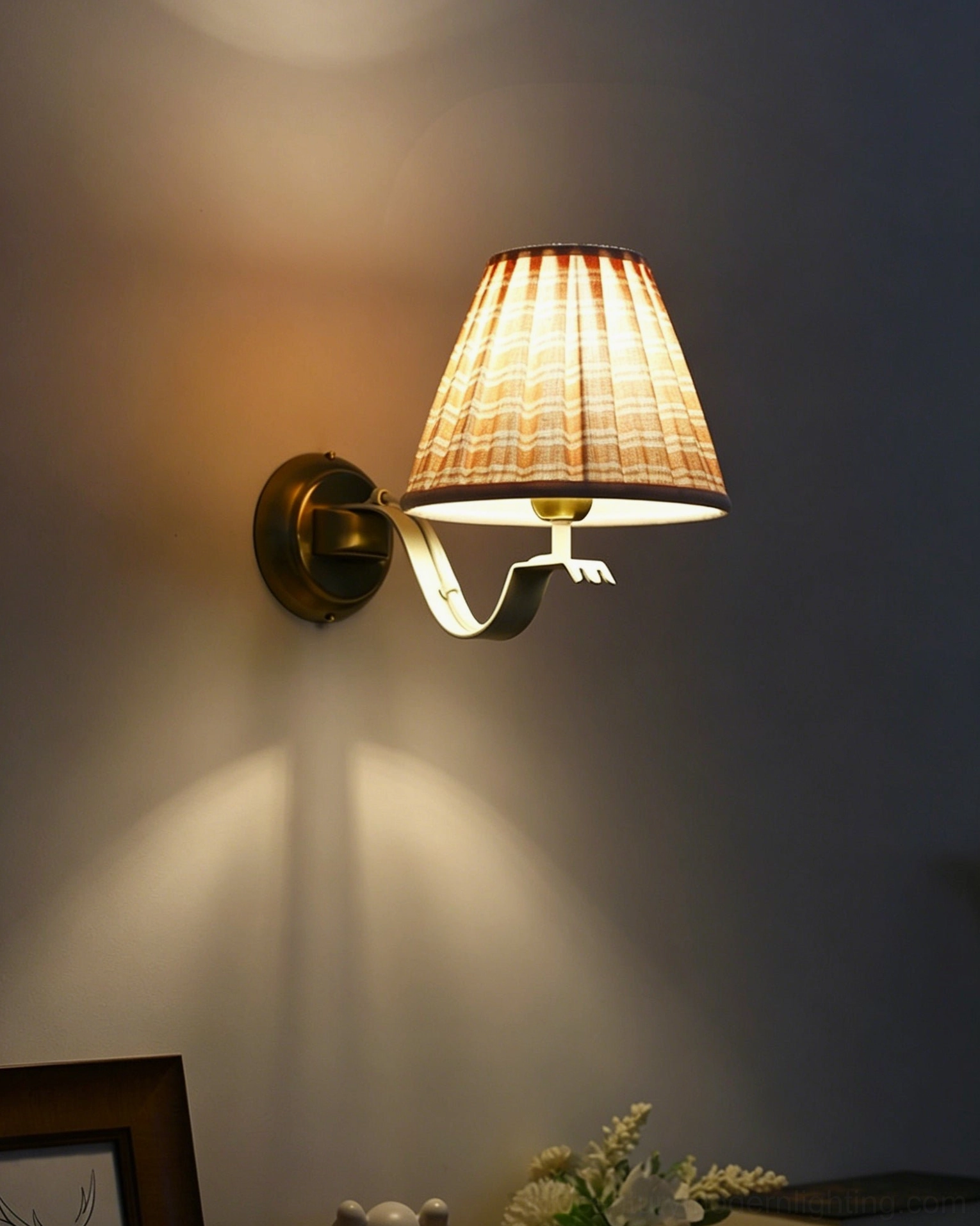 Penelope pleated wall sconce installed symmetrical pair flanking bed headboard in mid-century modern bedroom