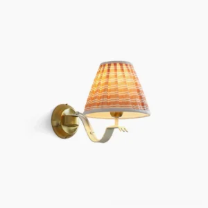 Penelope pleated wall sconce with orange and white striped fabric shade, cream white bracket, and brass curved arm - direct frontal view