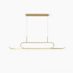 Penna linear LED chandelier with brass gold finish, frontal studio view showcasing minimalist mid-century modern design
