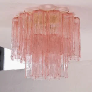 Pink fluted glass Peony ceiling fixture with two-tier textured glass and gold metal hardware, close-up illuminated