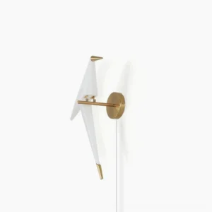 Perching Bird wall lamp with white acrylic body and gold metal hardware on plain background, frontal view