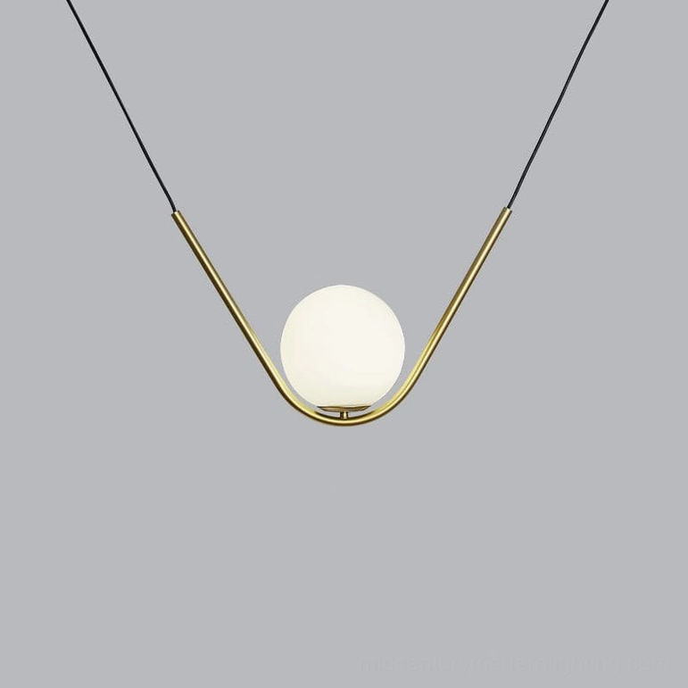 Perle three-head pendant arrangement in matte black showing linear spacing and multiple frosted globes