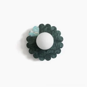Petal marble wall sconce front view with deep green stone and frosted glass globe on white background