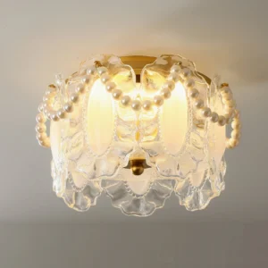 Petal Pearl model B ceiling fixture glowing with warm light, low-angle upward view