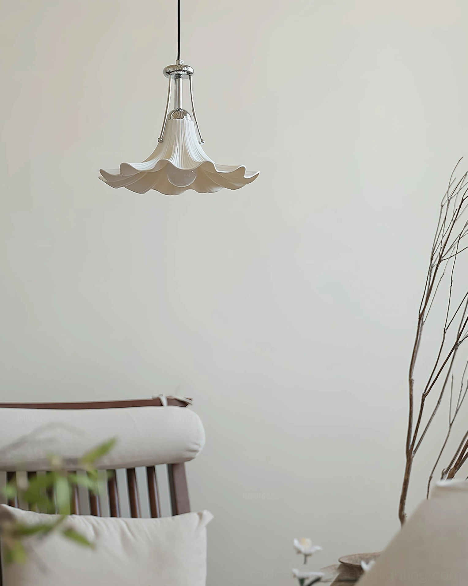 Petalia ruffled pendant light illuminated above dining area with wooden furniture and cozy home atmosphere